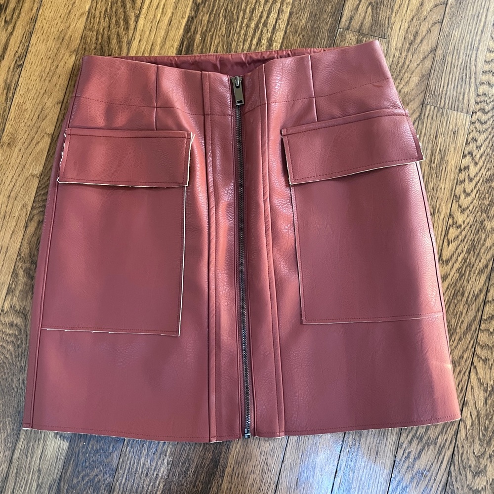 Almost new faux dark red leather mini skirt